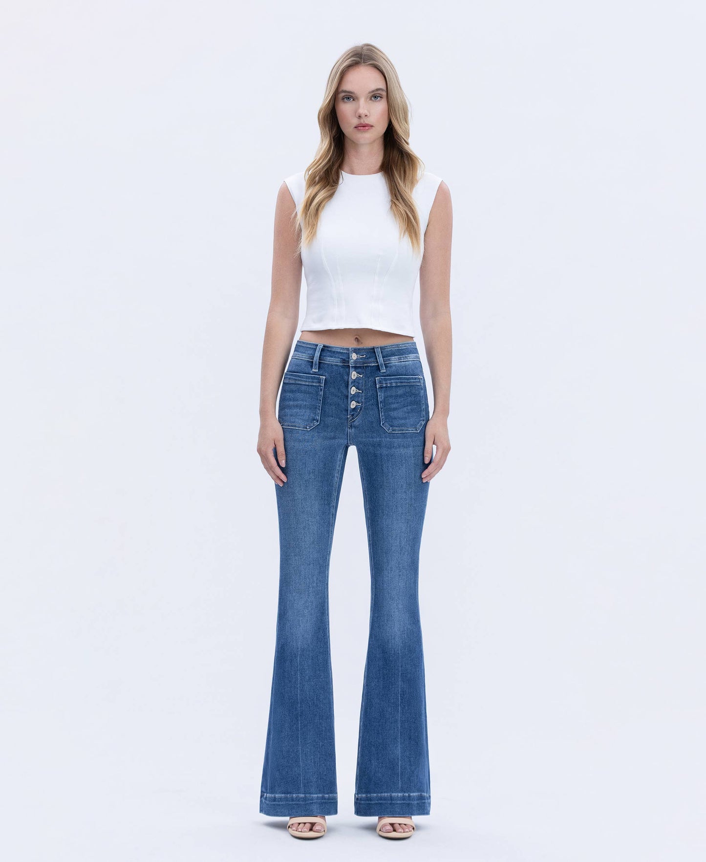 MID RISE BUTTON FLY TROUSER HEM FLARE JEANS