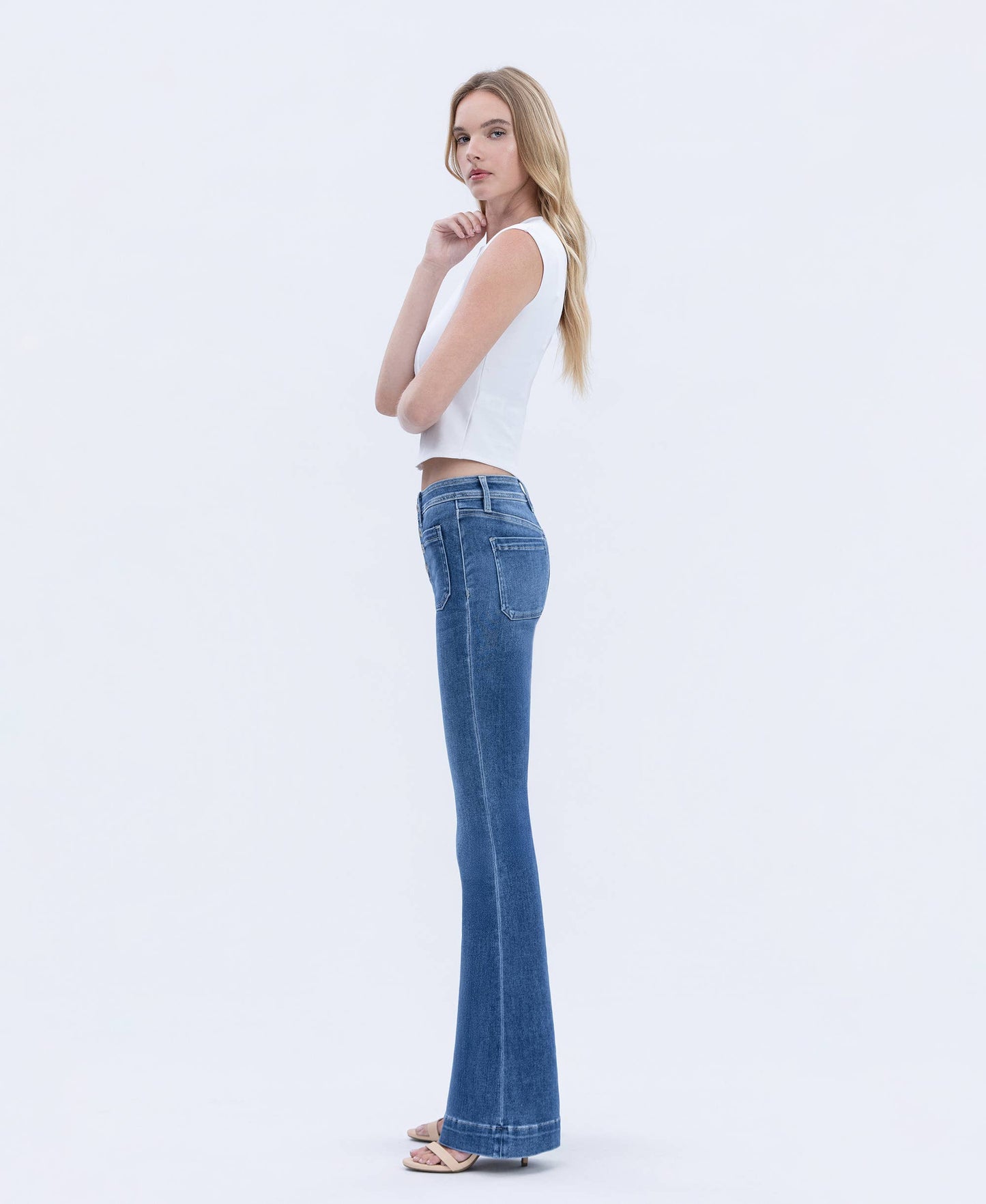 MID RISE BUTTON FLY TROUSER HEM FLARE JEANS