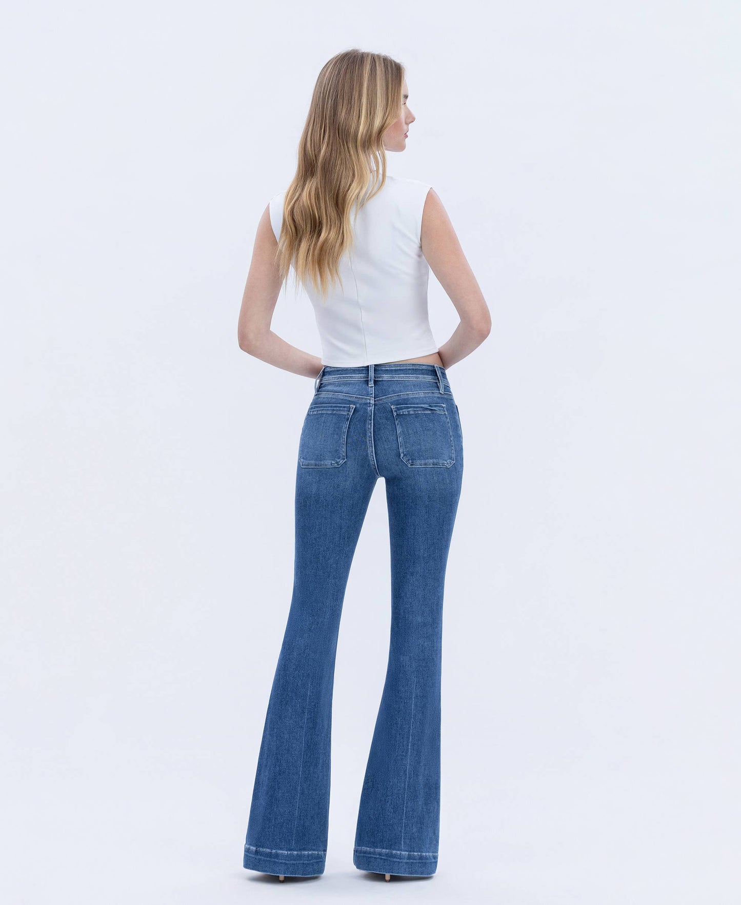 MID RISE BUTTON FLY TROUSER HEM FLARE JEANS