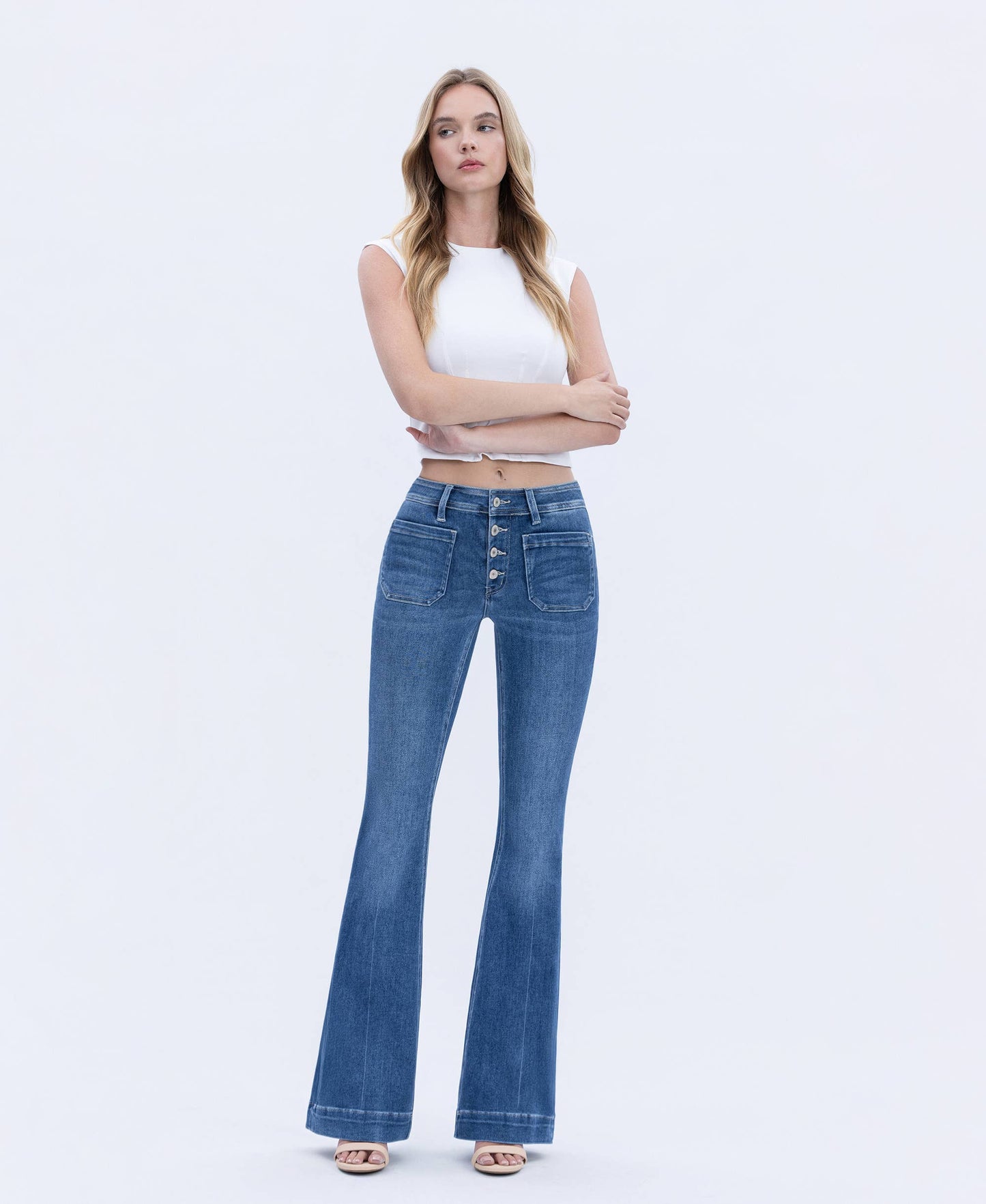 MID RISE BUTTON FLY TROUSER HEM FLARE JEANS