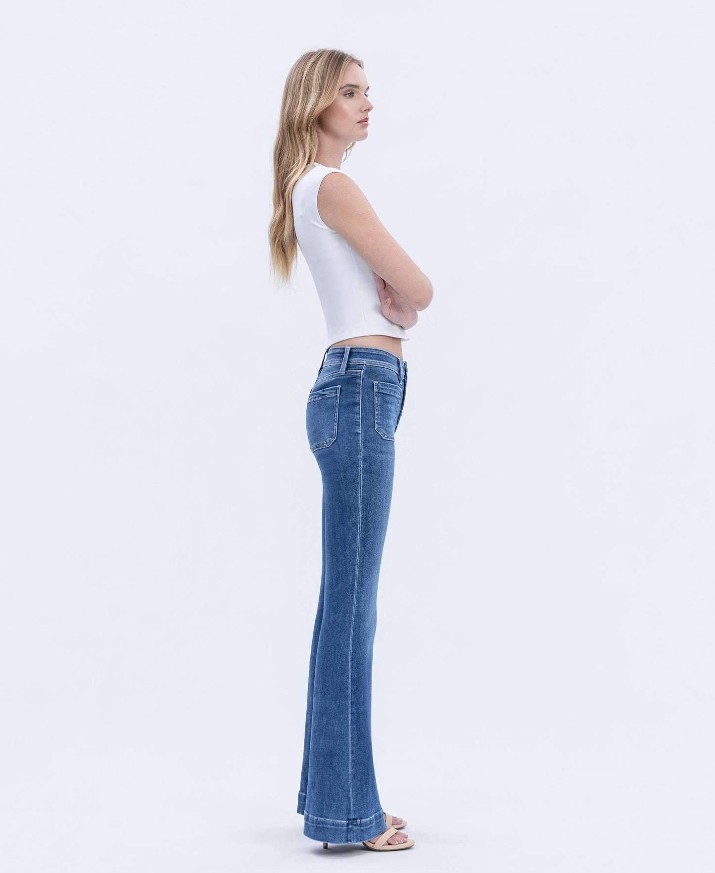 MID RISE BUTTON FLY TROUSER HEM FLARE JEANS